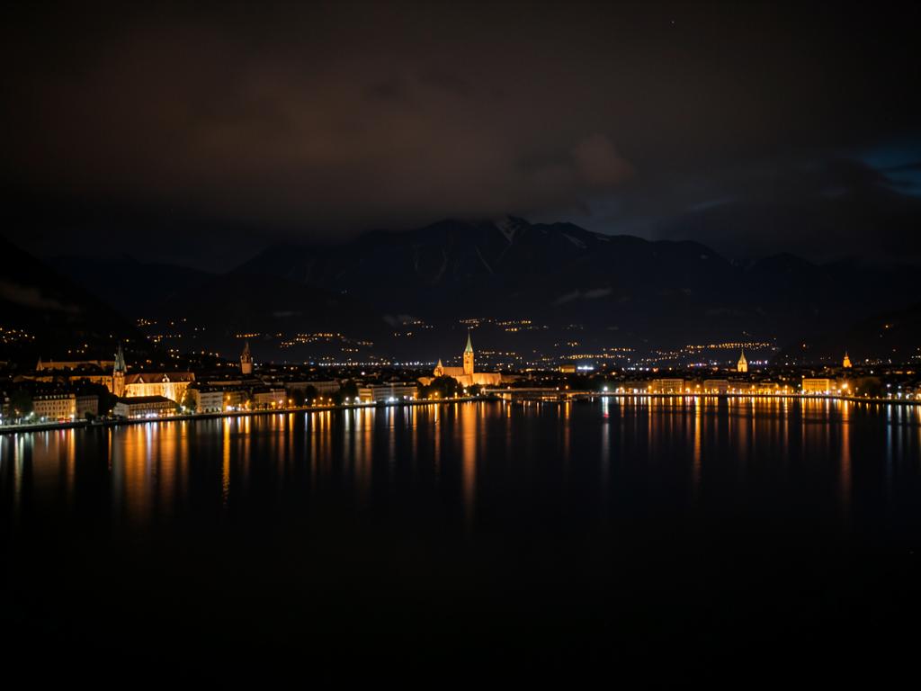 Lumières de Lausanne reflétées sur le Léman la nuit